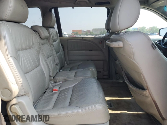 2010 Honda Odyssey EX-L z VIN 5FNRL3H74AB034608, wystawiony jako Copart lot #59262505 z przebiegiem 243 186 mil mil oraz Szkoda całkowita • Salvage title. Historia ofert i sprzedaży dostępna na DreamBid. Obrazek 11.