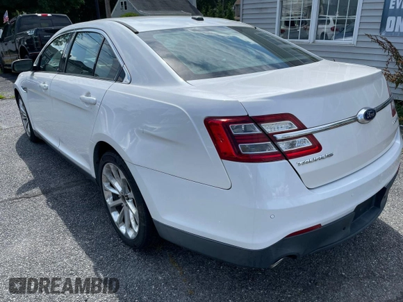 2015 Ford Taurus Limited with VIN 1FAHP2F80FG176642, listed as a Copart auction lot 64948025 with 159,916 mi miles and Clean title. Bid and sale history available at DreamBid. Image 3.