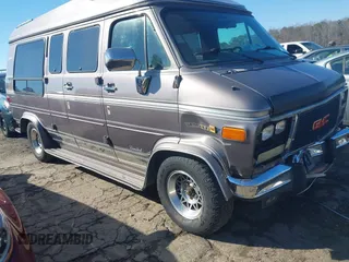 1993 GMC Vandura z VIN 1GDEG25KXPF515274, wystawiony jako IAAI lot #41663966 z przebiegiem 112 288 mil mil oraz . Historia ofert i sprzedaży dostępna na DreamBid. Obrazek 1.