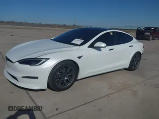 2022 Tesla Model S Plaid with VIN 5YJSA1E69NF486471, listed as a IAAI auction lot 41228818 with 49,207 mi miles and . Bid and sale history available at carsss.com. Image 19.