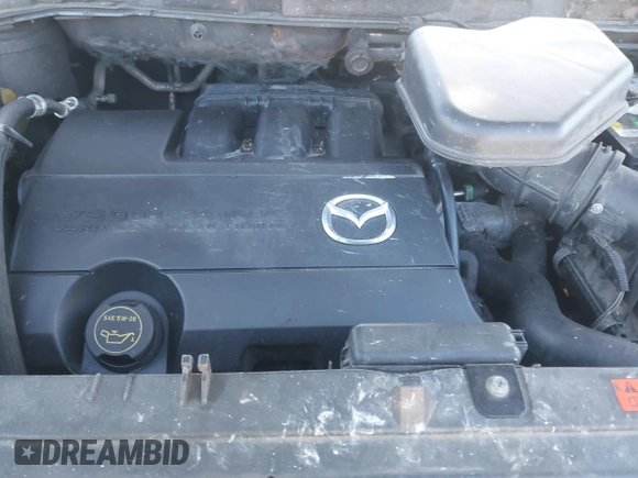 2012 Mazda CX-9 Sport z VIN JM3TB2BA8C0352473, wystawiony jako IAAI lot #41575179 z przebiegiem 251 859 mil mil oraz . Historia ofert i sprzedaży dostępna na DreamBid. Obrazek 10.