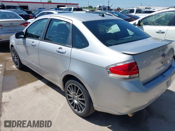 2009 Ford Focus SES with VIN 1FAHP36N69W102910, listed as a IAAI auction lot 42098402 with 149,957 mi miles. Bid and sale history available at carsss.com. Image 3.