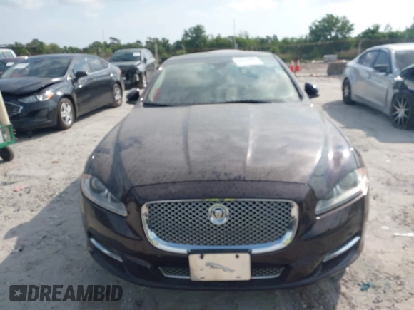 2013 Jaguar XJ Portfolio with VIN SAJWJ2GD2D8V44780, listed as a IAAI auction lot 41875069 with 87,806 mi miles and . Bid and sale history available at DreamBid. Image 6.