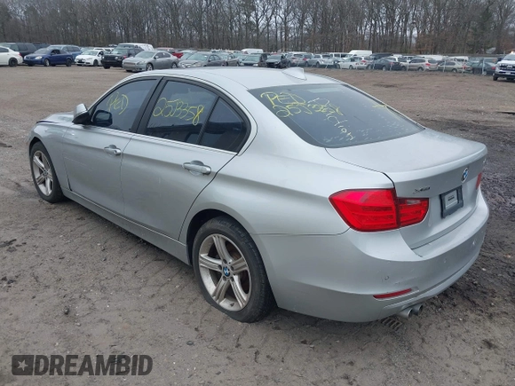 2015 BMW 3 Series 328i xDrive with VIN WBA3B5G57FNS12490, listed as a IAAI auction lot 41927689 with 999,999 mi miles. Bid and sale history available at carsss.com. Image 3.