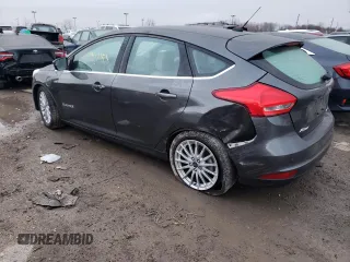 2016 Ford Focus Electric z VIN 1FADP3R46GL293146, wystawiony jako Copart lot #81911153 z przebiegiem 28 078 mil mil oraz . Historia ofert i sprzedaży dostępna na DreamBid. Obrazek 2.
