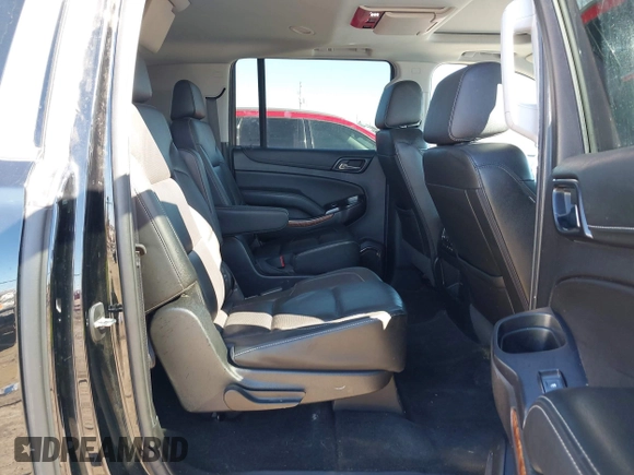 2018 Chevrolet Suburban Premier z VIN 1GNSCJKC5JR386545, wystawiony jako IAAI lot #41684349 z przebiegiem 130 511 mil mil oraz . Historia ofert i sprzedaży dostępna na DreamBid. Obrazek 8.