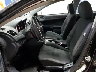 2010 Mitsubishi Lancer DE with VIN JA32U1FU5AU017835, listed as a Copart auction lot 87632195 with 122,600 mi miles and Salvage Title. Bid and sale history available at carsss.com. Image 7.