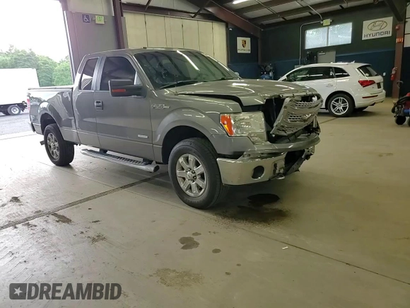 2014 Ford F-150 XL with VIN 1FTFX1ET3EKE32124, listed as a Copart auction lot 63598485 with 143,626 mi miles and Salvage title. Bid and sale history available at DreamBid. Image 14.