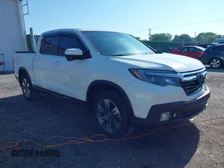 2017 Honda Ridgeline RTL-T with VIN 5FPYK3F69HB038048, listed as a IAAI auction lot 42583177 with 183,564 mi miles and . Bid and sale history available at DreamBid. Image 1.