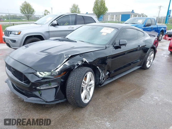 2021 Ford Mustang GT z VIN 1FA6P8CF2M5149643, wystawiony jako IAAI lot #41981794 z przebiegiem 57 345 mil mil oraz . Historia ofert i sprzedaży dostępna na DreamBid. Obrazek 2.