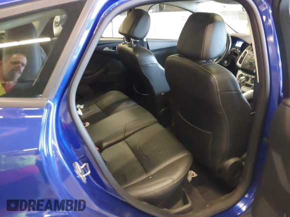2013 Ford Focus SE with VIN 1FADP3K26DL336078, listed as a IAAI auction lot 41754365 with 104,568 mi miles. Bid and sale history available at carsss.com. Image 8.