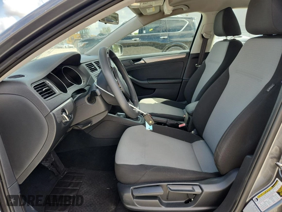 2017 Volkswagen Jetta S with VIN 3VW2B7AJ9HM344306, listed as a Copart auction lot 60256965 with 23,055 mi miles and Salvage title. Bid and sale history available at DreamBid. Image 7.