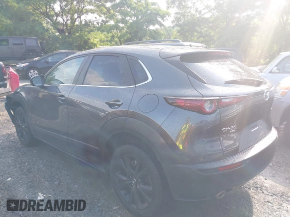 2024 Mazda CX-30 S Select Sport z VIN 3MVDMBBM1RM634542, wystawiony jako IAAI lot #42204673 z przebiegiem 24 694 mil mil oraz . Historia ofert i sprzedaży dostępna na DreamBid. Obrazek 14.