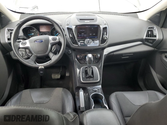 2013 Ford Escape Titanium z VIN 1FMCU0J98DUB64363, wystawiony jako Copart lot #54772925 z przebiegiem 109 956 mil mil oraz Szkody całkowita. Historia ofert i sprzedaży dostępna na DreamBid. Obrazek 8.