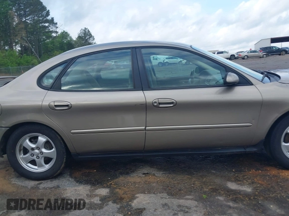 2003 Ford Taurus SE Standard with VIN 1FAFP53U63G125751, listed as a IAAI auction lot 41933803 with 196,710 mi miles. Bid and sale history available at carsss.com. Image 14.