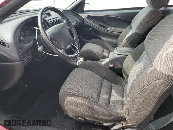 1994 Ford Mustang z VIN 1FALP45T9RF162535, wystawiony jako Copart lot #53549795 z przebiegiem 86 430 mil mil oraz Szkoda całkowita • Salvage title. Historia ofert i sprzedaży dostępna na DreamBid. Obrazek 7.