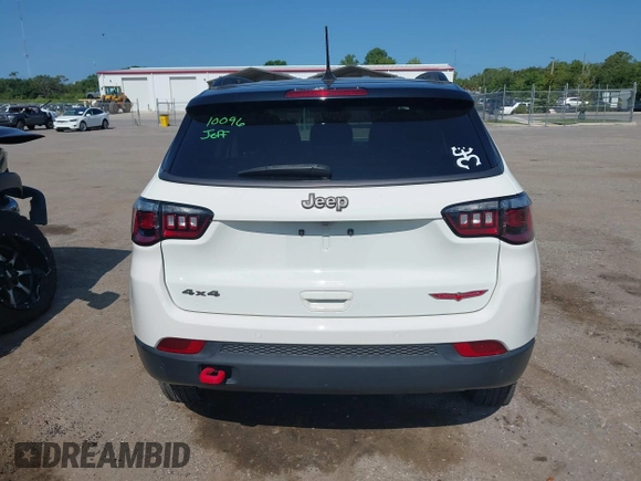 2021 Jeep Compass Trailhawk with VIN 3C4NJDDB7MT564467, listed as a IAAI auction lot 42330939 with 76,963 mi miles and . Bid and sale history available at DreamBid. Image 16.