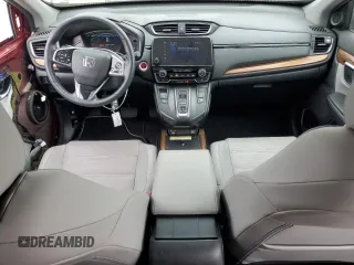 2021 Honda CR-V Touring z VIN 7FART6H96ME037070, wystawiony jako Copart lot #60664755 z przebiegiem 35 694 mil mil oraz Szkoda całkowita • Salvage title. Historia ofert i sprzedaży dostępna na DreamBid. Obrazek 8.
