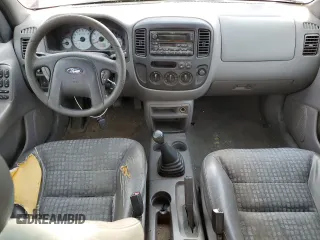 2002 Ford Escape XLS Value with VIN 1FMYU01B82KC15443, listed as a Copart auction lot 77998164 with 212,313 mi miles and Salvage title. Bid and sale history available at DreamBid. Image 8.