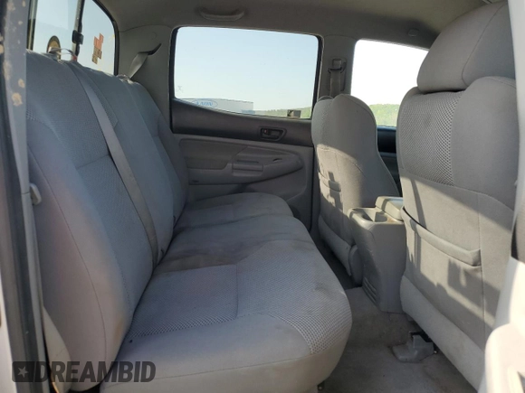 2007 Toyota Tacoma z VIN 5TEMU52N27Z381856, wystawiony jako Copart lot #52943985 z przebiegiem 241 481 mil mil oraz Szkoda całkowita • Salvage title. Historia ofert i sprzedaży dostępna na DreamBid. Obrazek 11.