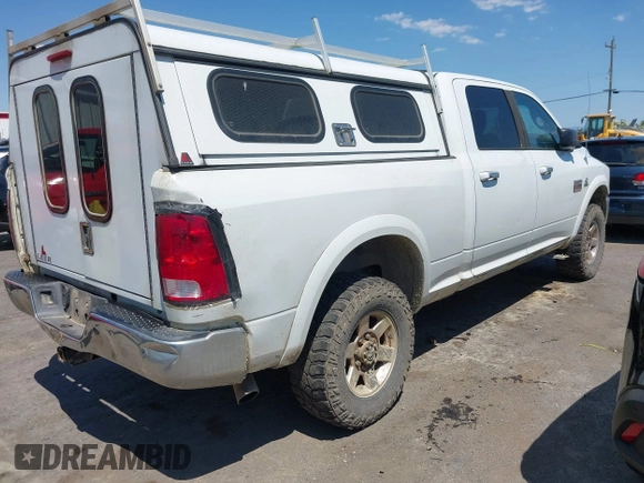 2012 Ram 2500 Laramie with VIN 3C6UD5FL1CG309889, listed as a IAAI auction lot 42484013 with 245,986 mi miles and . Bid and sale history available at DreamBid. Image 4.