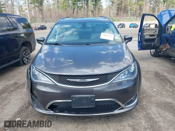 2017 Chrysler Pacifica Touring L with VIN 2C4RC1BGXHR667397, listed as a IAAI auction lot 42085117 with 63,996 mi miles and . Bid and sale history available at DreamBid. Image 12.