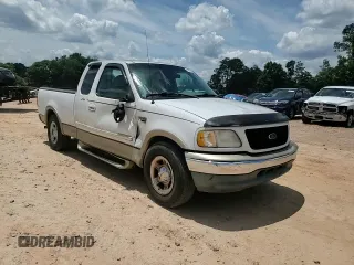 2000 Ford F-150 XL with VIN 1FTRX17L4YNB99870, listed as a Copart auction lot 60287985 with Not provided miles and Salvage title. Bid and sale history available at DreamBid. Image 13.