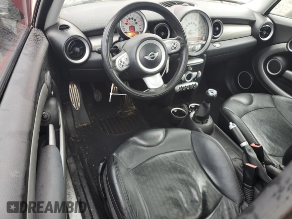 2007 MINI Hardtop S with VIN WMWMF73507TL86439, listed as a Copart auction lot 56500525 with 153,944 mi miles and Salvage title. Bid and sale history available at DreamBid. Image 8.