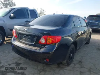 2009 Toyota Corolla with VIN 1NXBU40E19Z128054, listed as a IAAI auction lot 42085620 with 109,702 mi miles. Bid and sale history available at carsss.com. Image 4.
