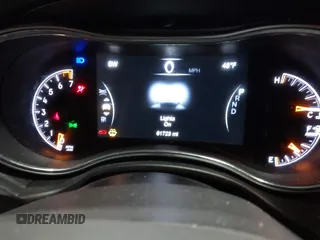 2020 Jeep Grand Cherokee Altitude with VIN 1C4RJFAG9LC344304, listed as a IAAI auction lot 41035821 with 61,723 mi miles and . Bid and sale history available at DreamBid. Image 7.