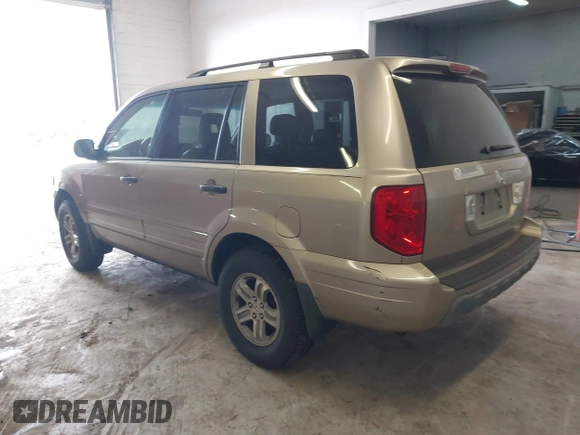2005 Honda Pilot EX-L with VIN 5FNYF18565B019345, listed as a IAAI auction lot 41641423 with 282,099 mi miles. Bid and sale history available at carsss.com. Image 3.