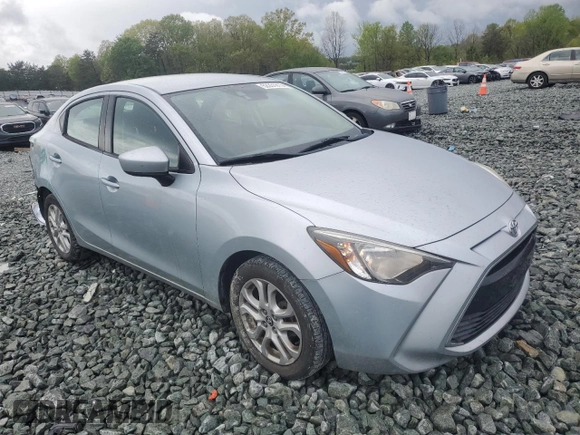 2018 Toyota Yaris with VIN 3MYDLBYV2JY329621, listed as a Copart auction lot 52351815 with 127,195 mi miles and Salvage Title. Bid and sale history available at DreamBid. Image 4.