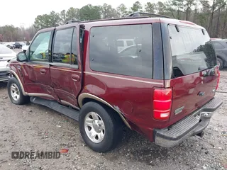 1997 Ford Expedition XLT with VIN 1FMEU17L1VLB73530, listed as a IAAI auction lot 40946365 with 414,612 mi miles and . Bid and sale history available at DreamBid. Image 3.