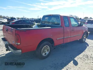 1997 Ford F-150 XL with VIN 1FTEX17L7VNC04389, listed as a IAAI auction lot 41030907 with 194,523 mi miles and . Bid and sale history available at DreamBid. Image 4.