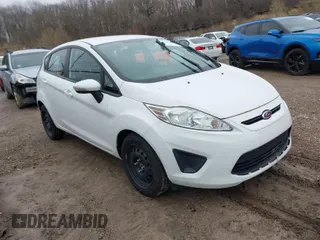 2013 Ford Fiesta SE with VIN 3FADP4EJ8DM193710, listed as a IAAI auction lot 42020003 with 95,625 mi miles. Bid and sale history available at carsss.com. Image 1.