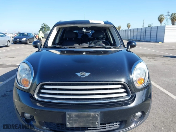 2013 MINI Cooper Countryman with VIN WMWZB3C52DWM07621, listed as a IAAI auction lot 42085389 with 153,714 mi miles. Bid and sale history available at carsss.com. Image 12.