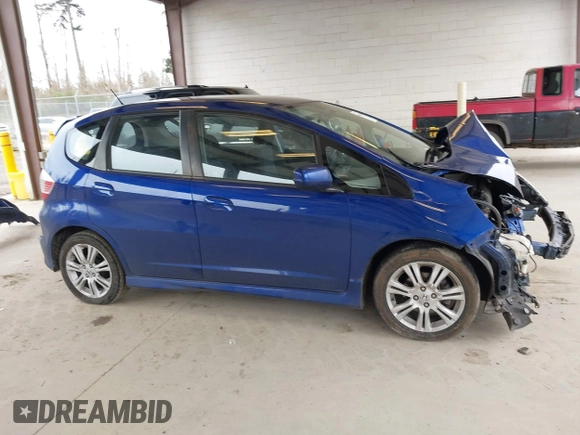 2009 Honda Fit Sport with VIN JHMGE88459C001743, listed as a IAAI auction lot 41852048 with 128,225 mi miles. Bid and sale history available at carsss.com. Image 14.