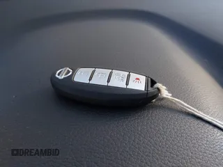 2014 Nissan Rogue S z VIN 5N1AT2MTXEC871520, wystawiony jako IAAI lot #41962820 z przebiegiem 109 541 mil mil oraz . Historia ofert i sprzedaży dostępna na DreamBid. Obrazek 11.
