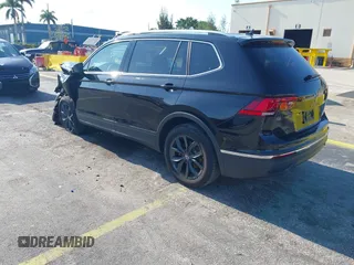 2024 Volkswagen Tiguan SE with VIN 3VVNB7AXXRM199400, listed as a IAAI auction lot 42216941 with 11,581 mi miles and . Bid and sale history available at DreamBid. Image 3.