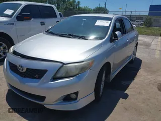 2010 Toyota Corolla with VIN 2T1BU4EE8AC488520, listed as a IAAI auction lot 42008146 with 182,354 mi miles and . Bid and sale history available at carsss.com. Image 2.
