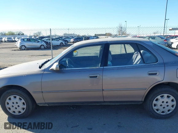 1995 Toyota Camry LE z VIN JT2SK12E0S0286848, wystawiony jako IAAI lot #41862969 z przebiegiem 220 923 mil mil oraz . Historia ofert i sprzedaży dostępna na DreamBid. Obrazek 6.