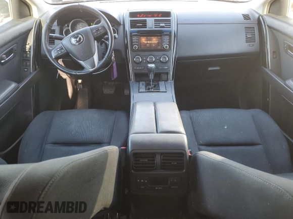 2015 Mazda CX-9 Sport с VIN JM3TB2BA4F0450064, выставлен на аукционе Copart как лот 86707144 с пробегом 163 743 миль миль и Списание • Salvage title. История ставок и продаж доступна на DreamBid. Изображение 8.