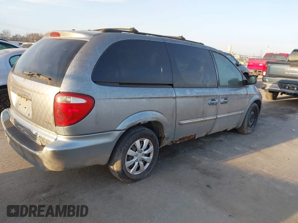 2005 Chrysler Town & Country Touring with VIN 2C4GP54L95R408571, listed as a IAAI auction lot 41792261 with 187,759 mi miles. Bid and sale history available at carsss.com. Image 4.