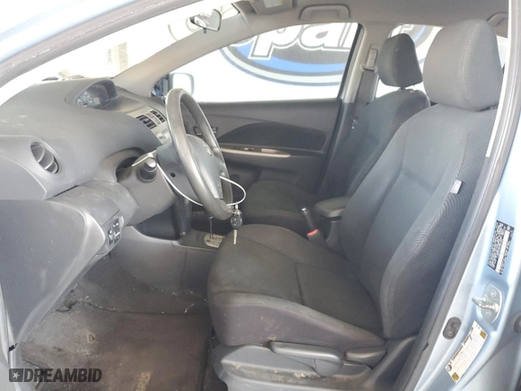 2009 Toyota Yaris with VIN JTDBT903994053624, listed as a Copart auction lot 53906565 with 227,211 mi miles and Salvage Title. Bid and sale history available at carsss.com. Image 7.