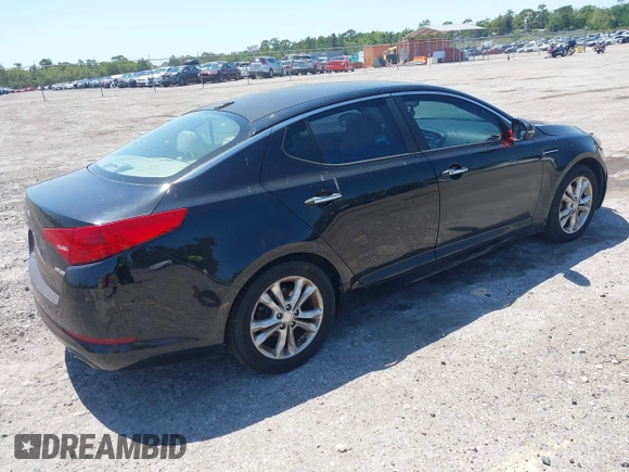 2012 Kia Optima EX with VIN 5XXGN4A70CG042190, listed as a IAAI auction lot 42003619 with 189,622 mi miles. Bid and sale history available at carsss.com. Image 4.