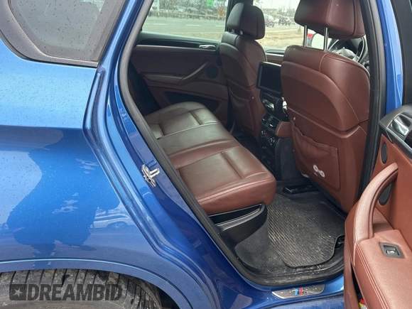 2013 BMW X6 M with VIN 5YMGZ0C57DLL29849, listed as a Copart auction lot 53517205 with 117,400 mi miles and Clean Title. Bid and sale history available at carsss.com. Image 6.