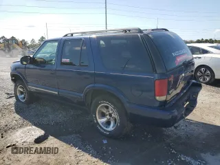 2001 Chevrolet Blazer LT z VIN 1GNCS13W812221839, wystawiony jako Copart lot #57048485 z przebiegiem 119 961 mil mil oraz Szkoda całkowita • Salvage title. Historia ofert i sprzedaży dostępna na DreamBid. Obrazek 2.
