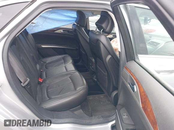 2013 Lincoln MKZ with VIN 3LN6L2J96DR800877, listed as a IAAI auction lot 41256557 with 125,584 mi miles. Bid and sale history available at carsss.com. Image 8.