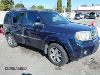 2010 Honda Pilot Touring with VIN 5FNYF4H80AB039371, listed as a IAAI auction lot 41817424 with 202,306 mi miles. Bid and sale history available at carsss.com. Image 1.