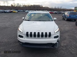 2016 Jeep Cherokee Latitude z VIN 1C4PJMCB7GW118036, wystawiony jako IAAI lot #41232593 z przebiegiem 114 880 mil mil oraz . Historia ofert i sprzedaży dostępna na DreamBid. Obrazek 12.